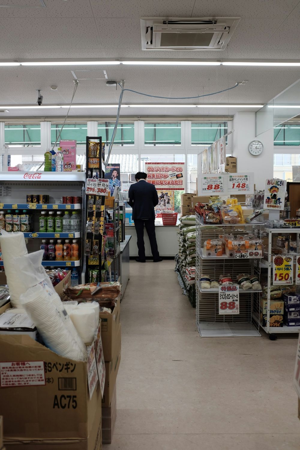 Warm ambient lighting in a grocery aisle