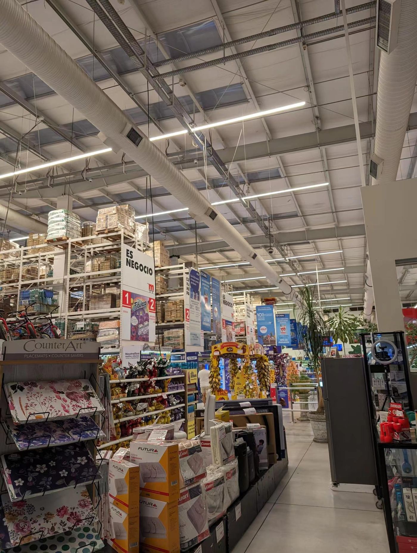 Supermarket aisle with fresh produce displays, Uruguay